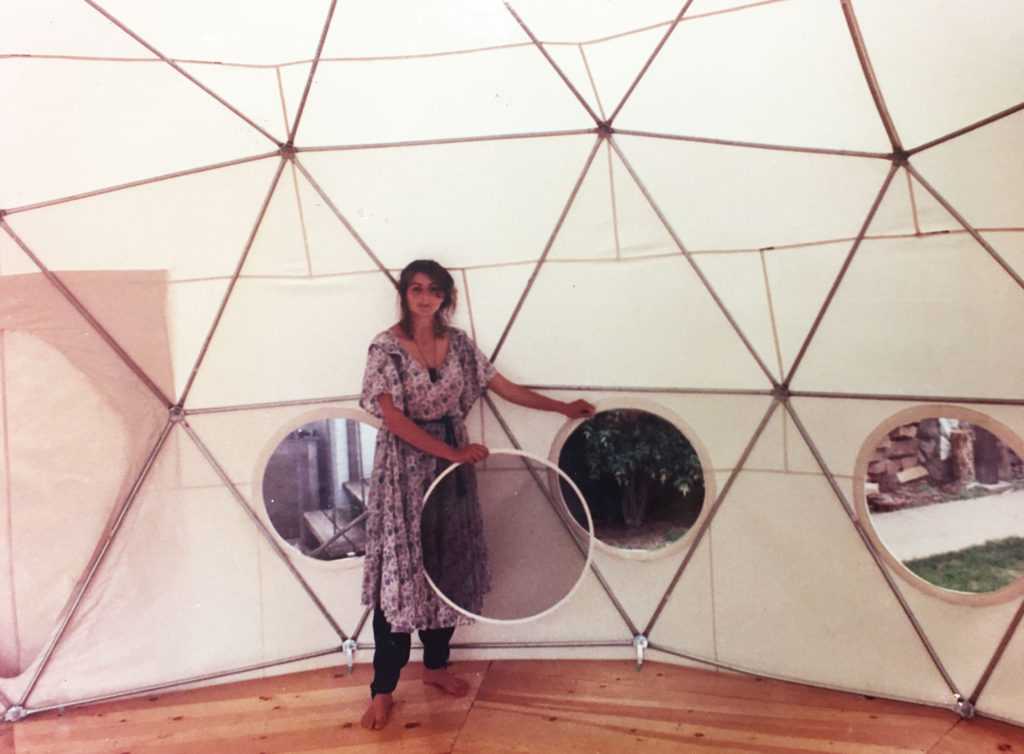 Asha Deliverance in one of her first domes, showing a screen for the round window