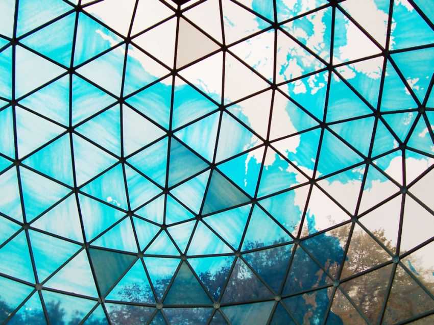 The dome is a transparent blue representation of Spaceship Earth