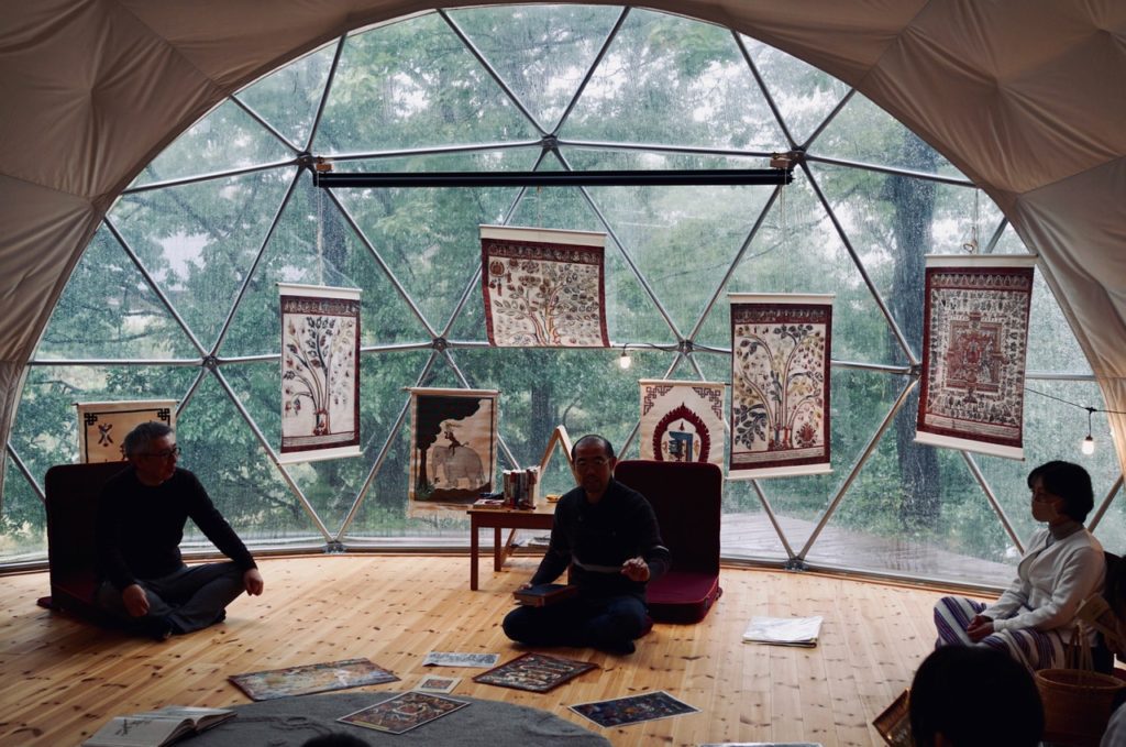 Monks in Amaterasu Dome- Luxuna Camp Japan